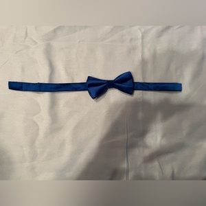 Blue bow tie.